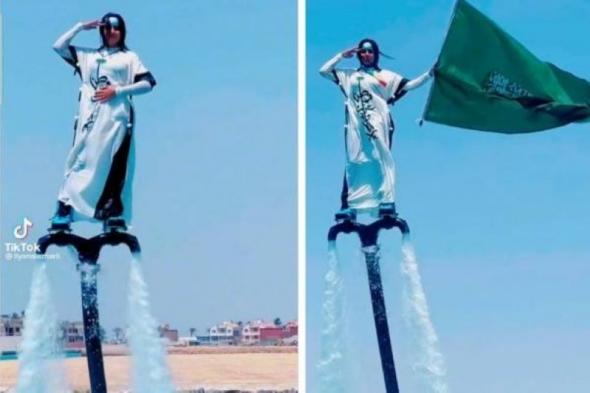 شاهد: فيديو لفتاة سعودية تحتفل باليوم الوطني بعرض مثير داخل مياه البحر