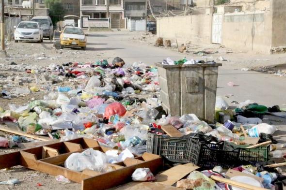 "الإيمان" سرّها.. عراقية فقدت أبناءها الأربعة وتقتات من القمامة
